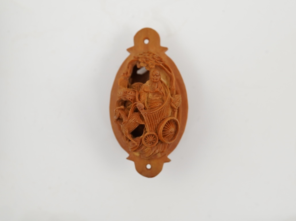 A Chinese silver filigree work and enamel scent bottle, by Wongshing, three carved peach stones, and a kernel and turquoise bead necklace, late 19/early 20th century